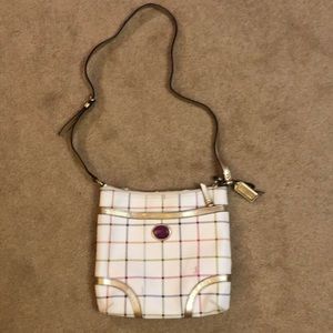 Coach crossbody purse. Cream / plaid